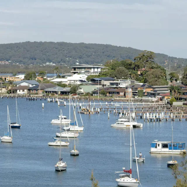 Waterfront houses along Brisbane Water Dr and Couche Cr