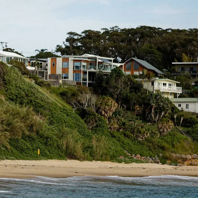 Houses above Cabbage Tree Bay on Bungary Rd